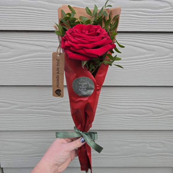 Individual wrapped rose